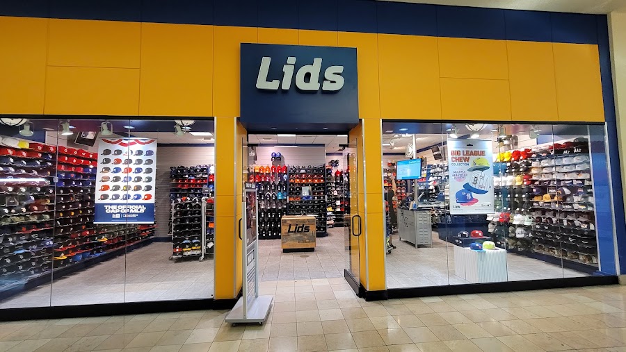 Lids Westshore Plaza storefront and hat wall
