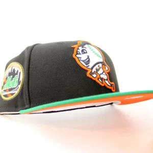 New Era New York Mets fitted hat GITD Black Kelly Green Orange Under Brim colorway - New Era Drops Glow-in-the-Dark Mets Fitted with Skyline Design