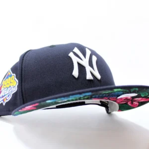 New Era New York Yankees fitted hat Glow in the Dark Logo Navy Dark Floral Under Brim colorway - Dynasty Perfection Fitted: New Era Drops 1999 World Series Yankees Tribute with Glow-in-the-Dark Twist
