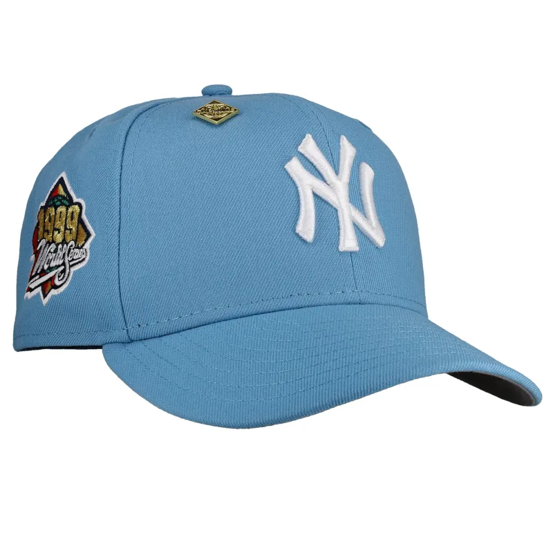 New Era New York Yankees fitted hat grey, blue colorway - 1999 World Series Fitted: New Era’s Skyline Dynasty Metallic 59FIFTY Celebrates Millennium Champions