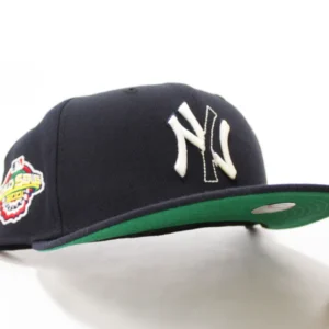 New Era New York Yankees fitted hat Tear off Logo Navy Green Under Brim colorway - 2001 World Series Fitted: New Era Honors Yankees’ Heartbreaking Classic