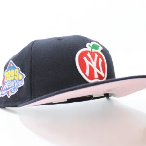 New Era New York Yankees fitted hat Navy Pink Under Brim colorway - Dynasty Domination Fitted: New Era’s Big Apple Yankees 1999 World Series Championship Hat