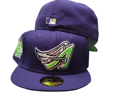 New Era Los Angeles Angels fitted hat green, purple colorway - New Era Drops Bold Angels Fitted with 40th Season Side Patch