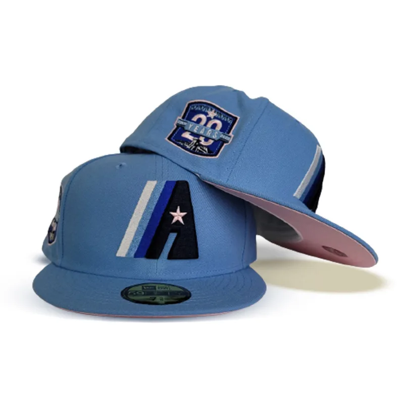 New Era Houston Astros fitted hat blue, pink colorway - Astros Anniversary Fitted: New Era’s Sky Blue 20th Anniversary Tribute with Pink Bottom