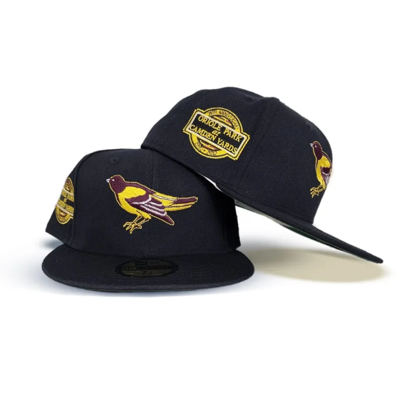 New Era Baltimore Orioles fitted hat navy, blue, green colorway - Iron Man Anniversary Fitted: New Era Drops Navy Blue Orioles 20th Anniversary Tribute