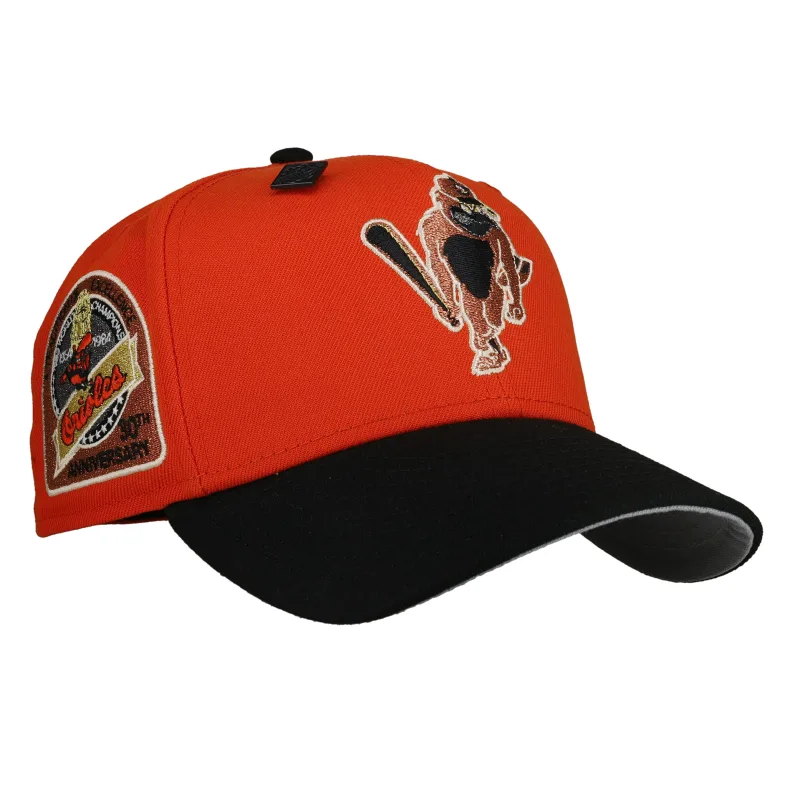 New Era Baltimore Orioles fitted hat black, grey, orange colorway - Three Decades Strong Fitted: New Era Celebrates Baltimore Orioles 30th Anniversary with Metallic Orange Drop
