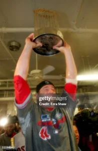 Boston Red Sox players celebrating their 2004 World Series championship victory over Cardinals
