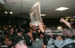 2005 Chicago White Sox World Series championship celebration with players and trophy
