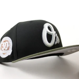 New Era Baltimore Orioles fitted hat Black Olive Green Gray Under Brim colorway - Iron Man Legacy Fitted: New Era’s Orioles 30th Anniversary Tribute to Cal Ripken’s Record