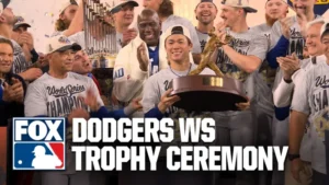 2025 World Series logo and championship trophy with Dodgers and Blue Jays team logos