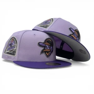 New Era Baltimore Orioles fitted hat purple colorway - Iron Man Anniversary Fitted: New Era Celebrates Cal Ripken’s Historic Streak in Lavender Purple