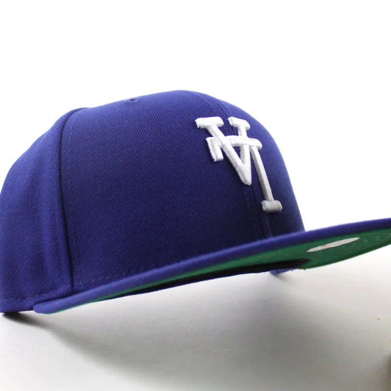 New Era Los Angeles Dodgers fitted hat Royal Blue Green Under Brim colorway - Dodgers Fitted Gets Flipped: New Era’s Upside Down Logo Drop