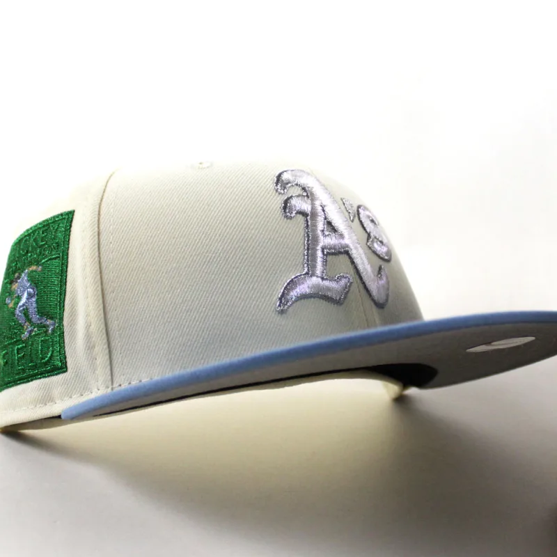 New Era Oakland Athletics fitted hat Chrome White Sky Blue Gray Under Brim colorway - Oakland Athletics Ricky Henderson New Era 59Fifty Fitted Hat (Chrome White Sky Blue Gray Under Brim)