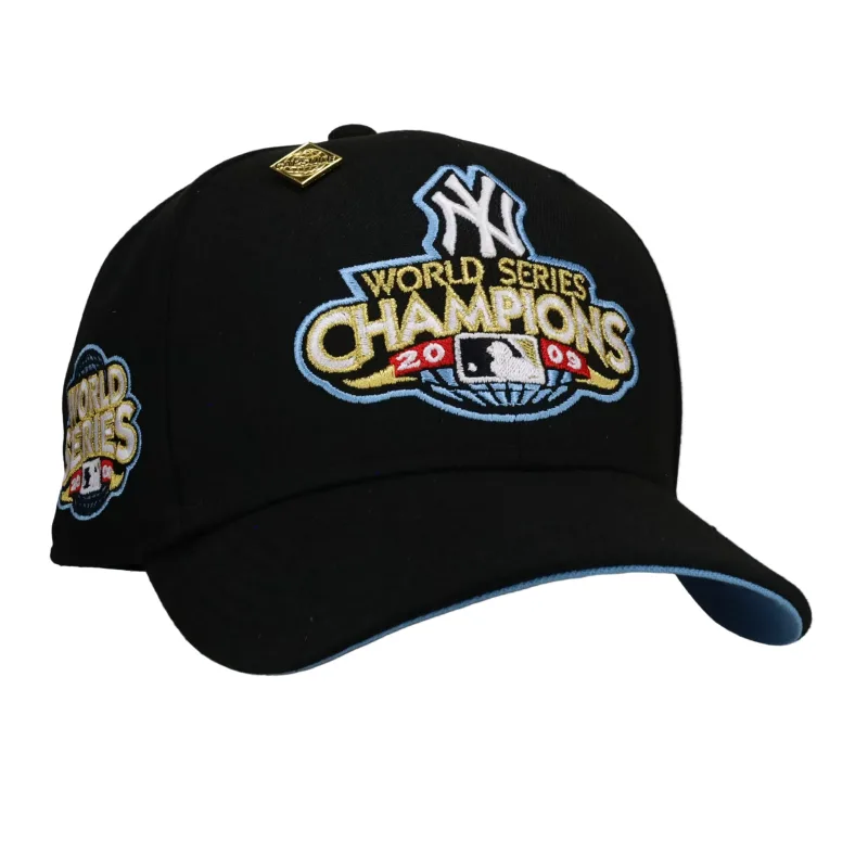 New Era New York Yankees fitted hat black, blue colorway - New York Yankees 2009 World Series Script Black/Blue Brim 59Fifty Fitted Hat