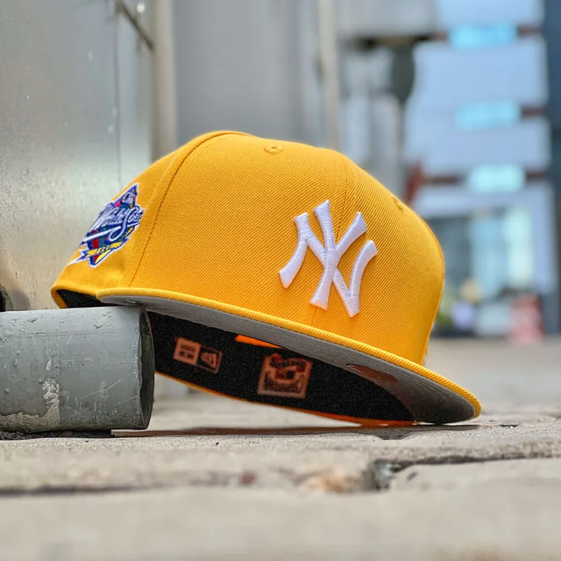 New Era New York Yankees fitted hat gray, yellow colorway - NEW ERA 59FIFTY MLB NEW YORK YANKEES 1999 WORLD SERIES YELLOW GRAY UV FITTED CAP