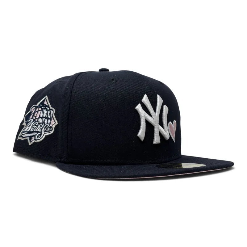 New Era New York Yankees fitted hat navy, blue, pink colorway - New York Yankees 1999 World Series with heart Pink Brim Fitted Hat-Navy