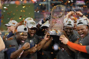 Houston Astros players celebrating on the field after winning the 2022 World Series